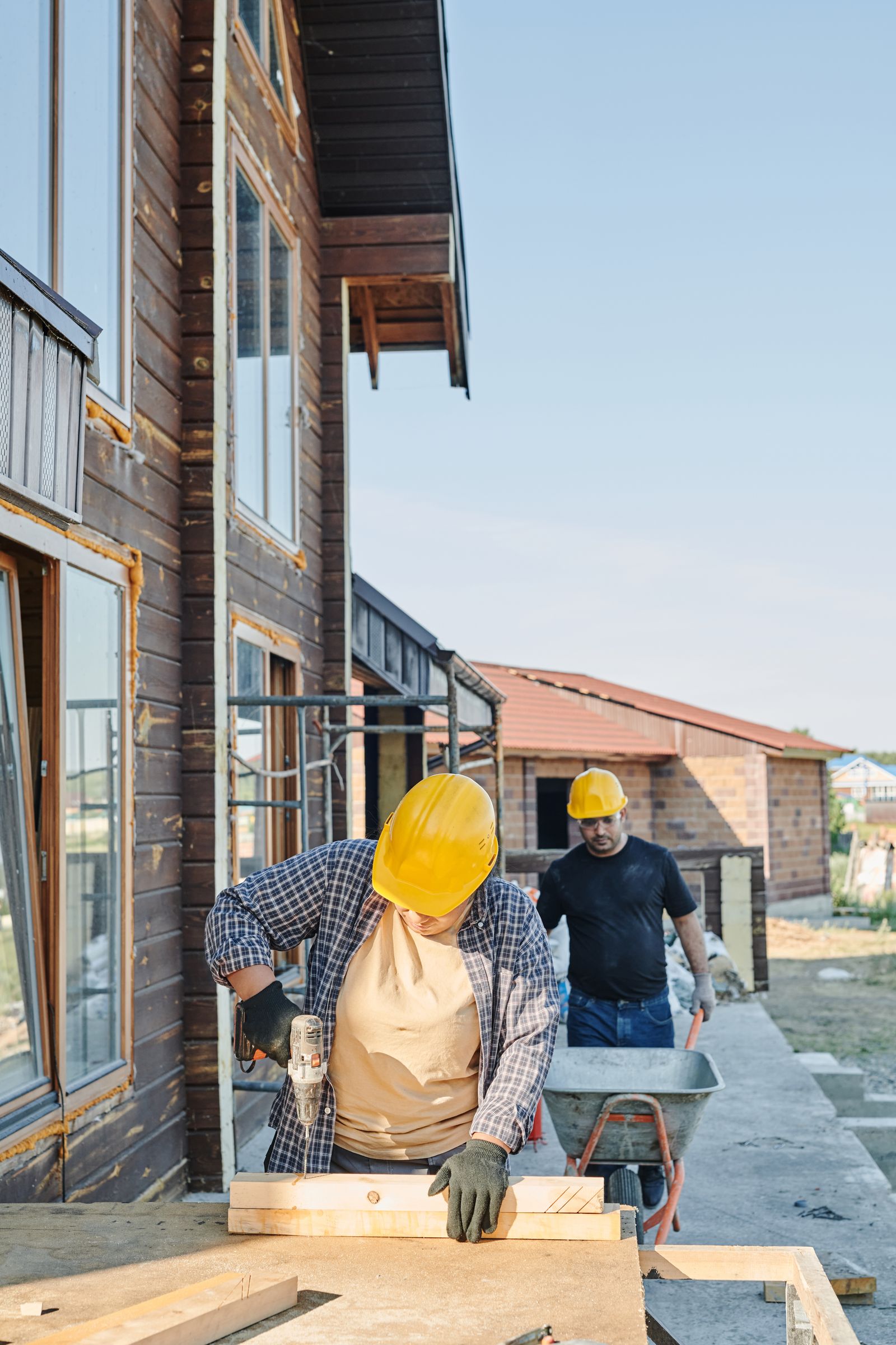 Trade professionals working at a residential construction site